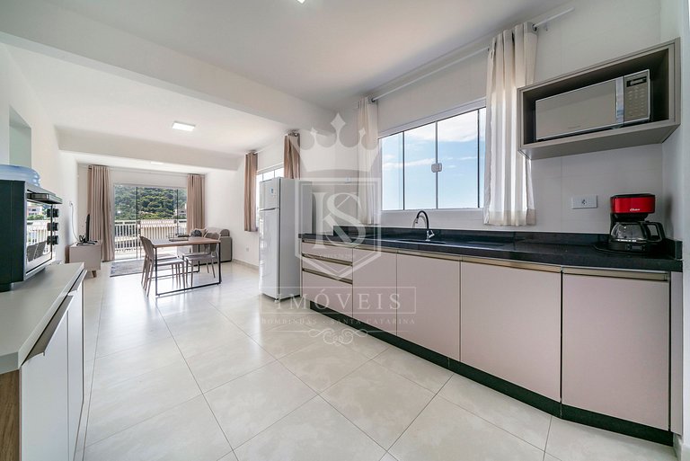 A106 - Apartamento de 02 dormitórios próximo à praia de 4 Il