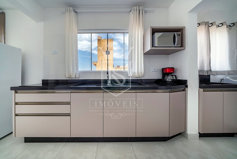 A106 - Apartamento de 02 dormitórios próximo à praia de 4 Il