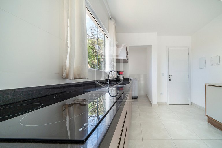 A106 - Apartamento de 02 dormitórios próximo à praia de 4 Il