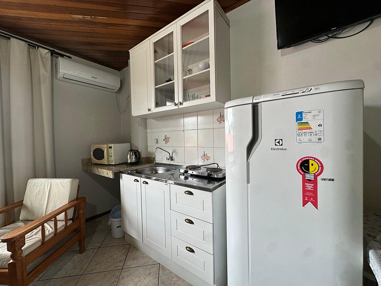 Suíte para até 04 pessoas bem localizada na praia do Centro